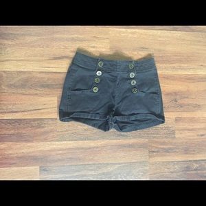Black button shorts